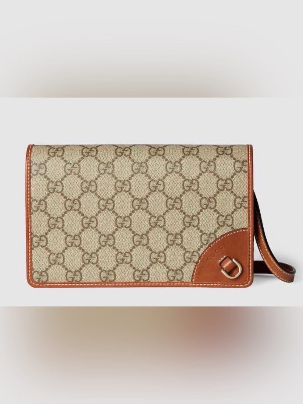 Gucci GG Emblem wallet with leather strap